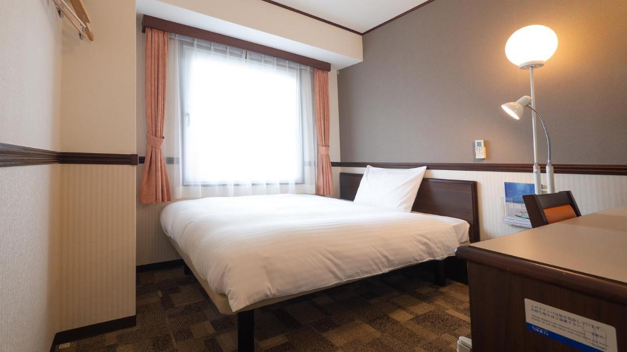 Toyoko Inn Shin-Osaka Chuo-Guchi Honkan Buitenkant foto